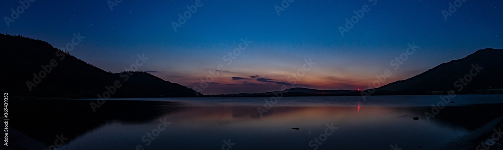A Panoramic view of Bassenthwaite lake in the blue hour on a summers night.