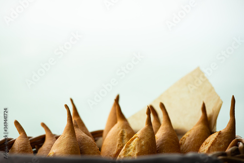 Wicker basket full of baguettes, tasty delicious crusty bread.Copy space.