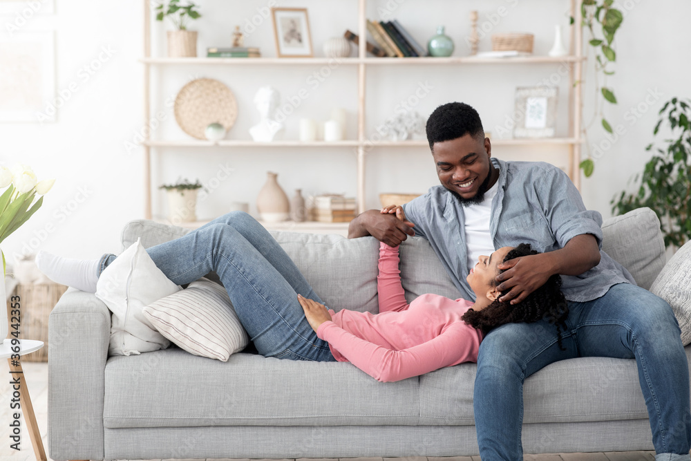 Romantic Moments. Black Couple In Love Bonding Together While Relaxing At Home Romantic Moments. Black Couple In Love Bonding Together While Relaxing At Home