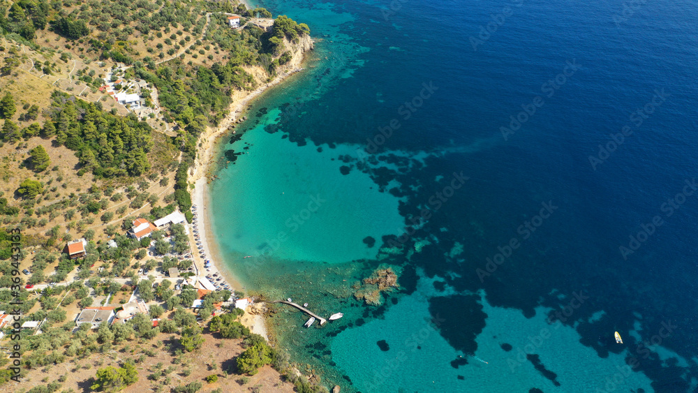 Aerial drone photo of famous turquoise beach of Mourtias in island of Alonissos, Sporades, Greece