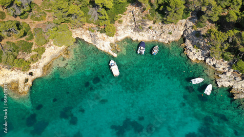 Aerial drone photo of famous small fishing port and village of Votsi in island of Alonissos, Sporades, Greece photo