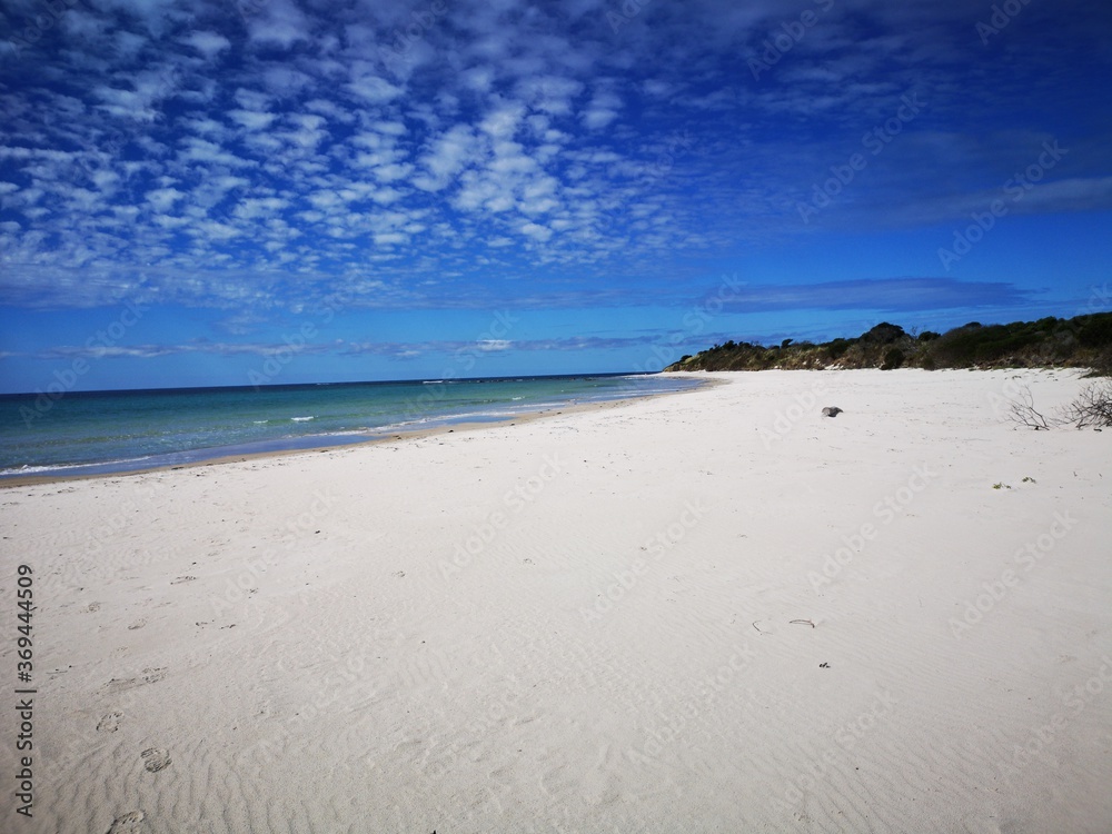 Sisters Beach - beautiful blue sky day on the north west Tasmanian coast with white sands and aqua blue seas - Australia