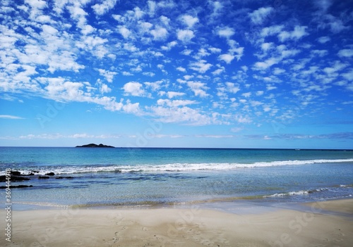 Sisters Beach - beautiful blue sky day on the north west Tasmanian coast with white sands and aqua blue seas - Australia