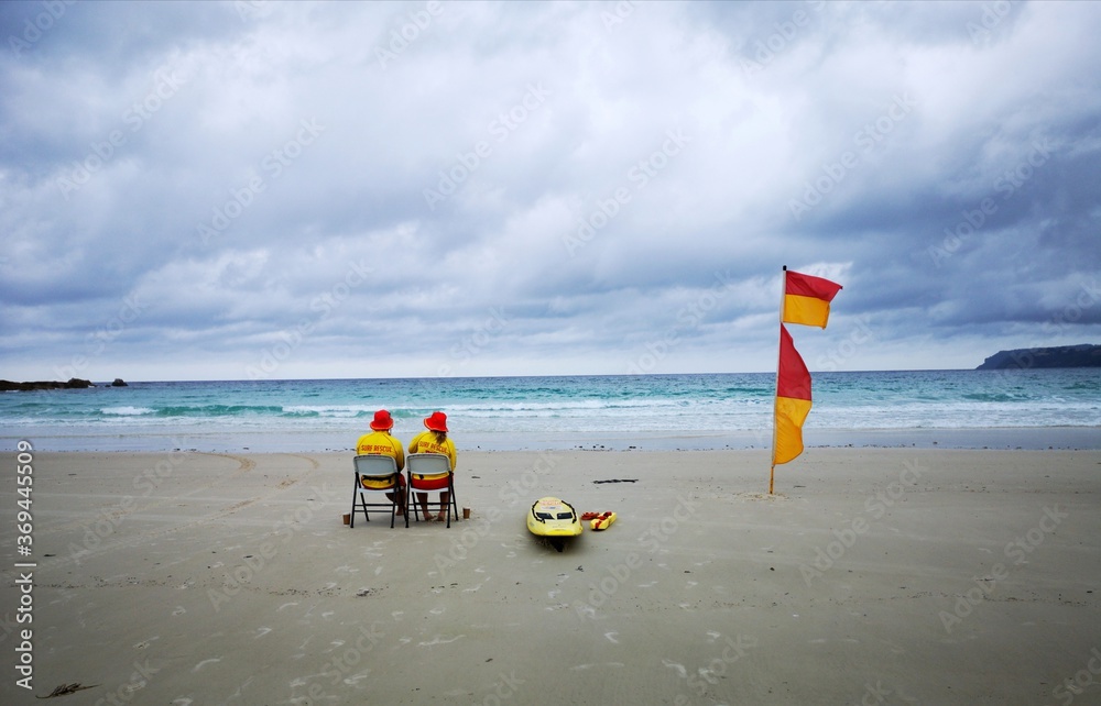 Red and Yellow Flag signifying the safe swim zone on Boat Harbour Beach in north west Tasmania.