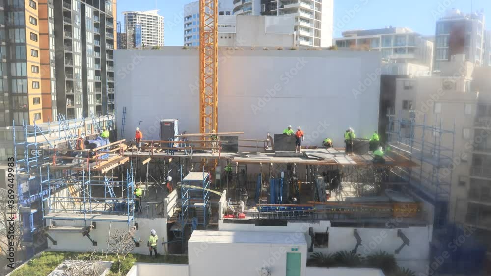 Men at work at construction site building new house – short time lapse 4k.
