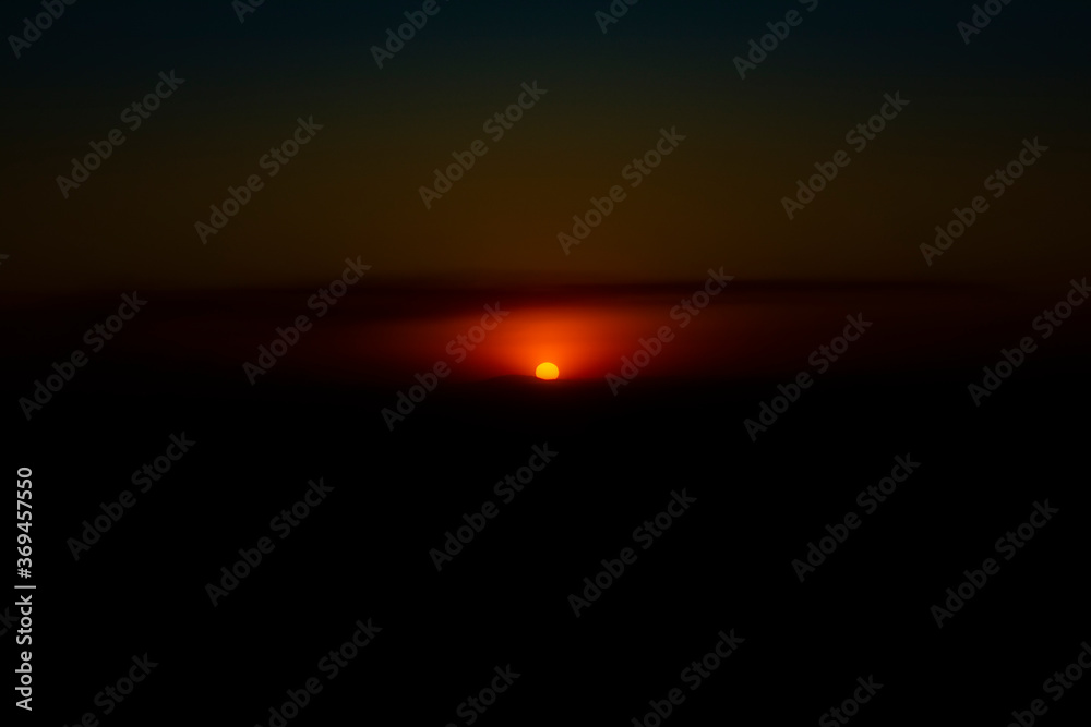 The beautiful sunset between the hills The beautiful sunset between the hills