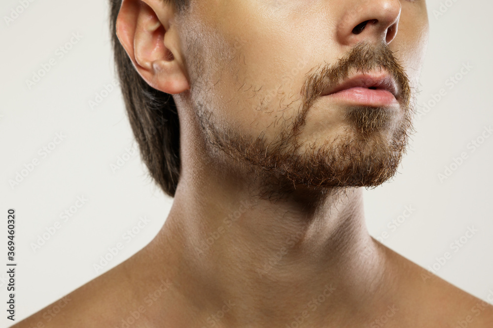 Unshaved man with a unkempt beard Unshaved man with a unkempt beard