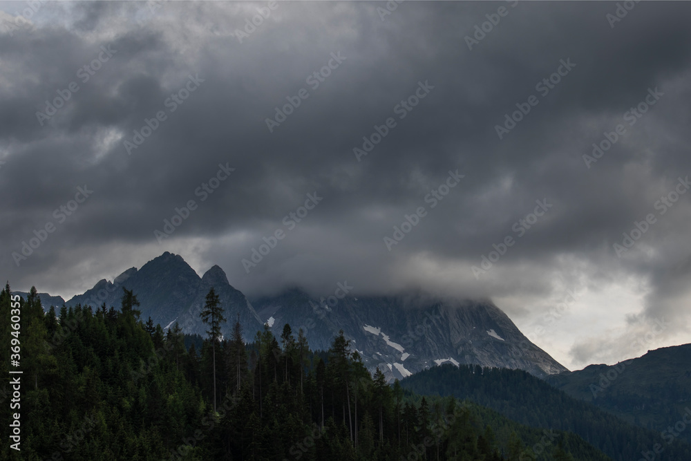 Storm clouds over mountains in the Alps