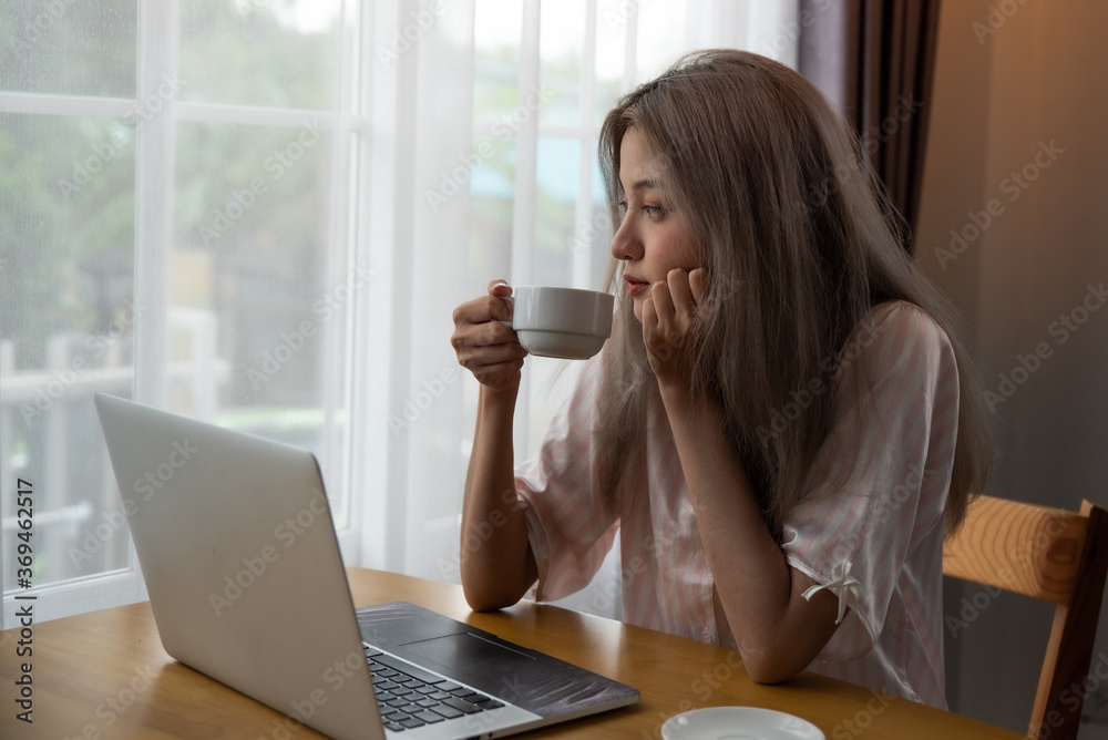 Lazy woman drinking morning coffee at home. Lazy woman drinking morning coffee at home.
