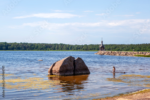 Wallpaper Mural Picturesque Dubkovaya Bay of the Gulf of Finland with a view of the chapel of St. Nicholas the Wonderworker. Recreation center "Okunevaya". Vysokinsky massif. Leningrad region. Russia Torontodigital.ca