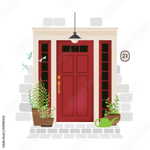 Beautiful vintage door with plants in pots on both sides