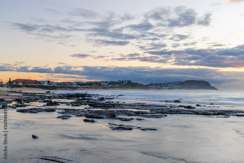 Merewether Beach and Newcastle skyline view in the morning. Merewether Beach and Newcastle skyline view in the morning.
