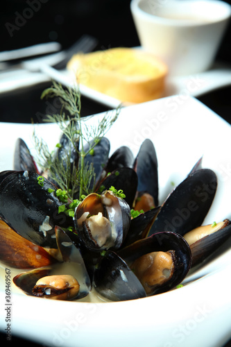 A Bow Of The Boiled Mussels With White Wine Sauce