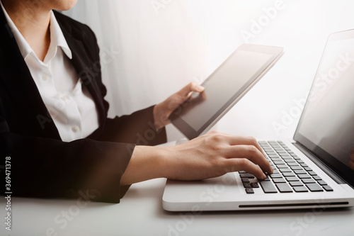Searching Browsing Internet Data Information with blank search bar.businessman working with smart phone, tablet and laptop computer on desk in office. Networking Concept