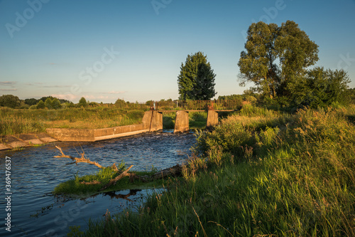 Obraz na płótnie Dam over the Liwiec river near Siedlce, Masovia, Poland w salonie