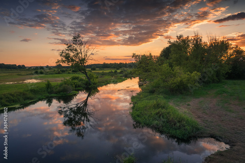 Obraz na płótnie Sunset over the Liwiec river near Siedlce, Masovia, Poland w salonie