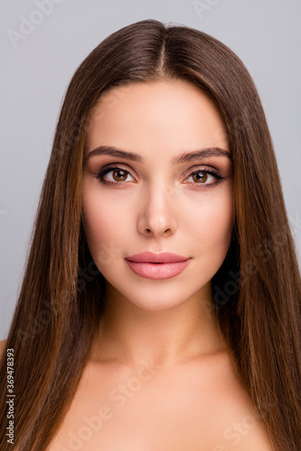 Vertical view close-up portrait of her she nice-looking attractive lovely charming cute gorgeous straight-haired girl smooth soft skin perfection isolated over gray pastel color background