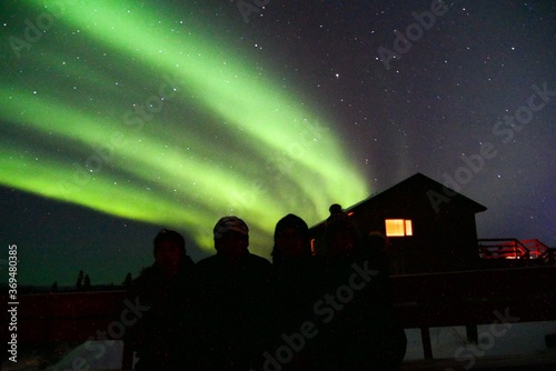 Silhouette of tourist  with norther light background in Fairbanks  Alaska