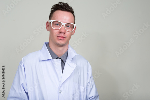 Portrait of young man doctor with eyeglasses