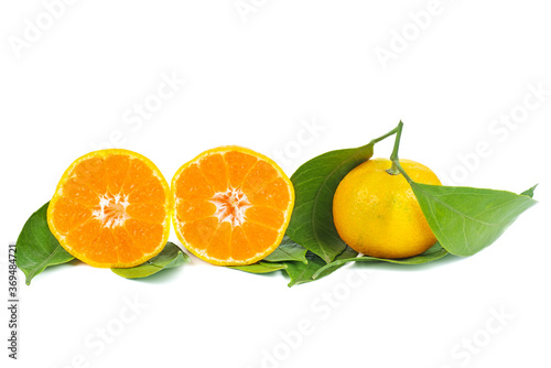 Fototapeta Naklejka Na Ścianę i Meble -  Mandarines, tangerine or clementine with leaves isolated on white background