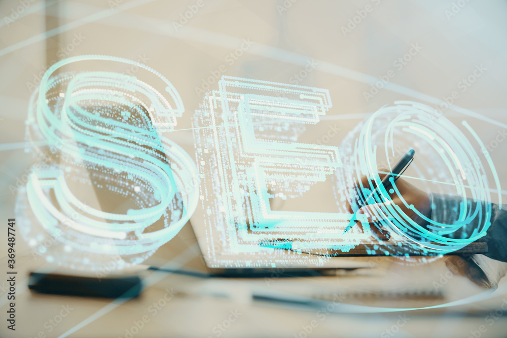 Double exposure of seo icon with man working on computer on background. Concept of search engine optimization. Double exposure of seo icon with man working on computer on background. Concept of search engine optimization.