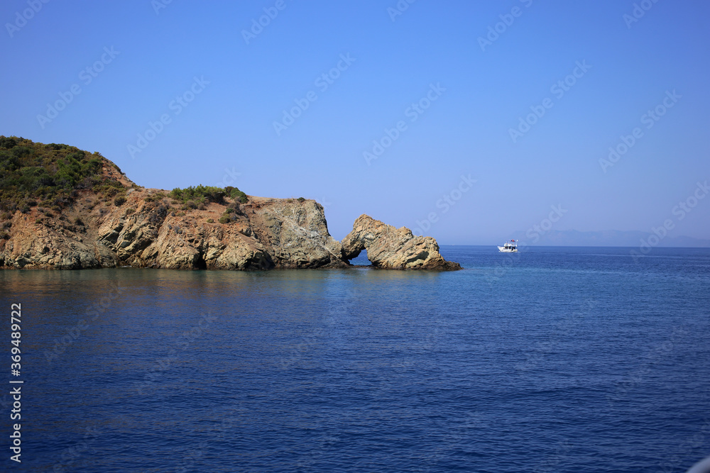 Wonderful bizarre cliffs in the Mediterranean Sea, bays near the resort town of Fethiye in Turkey.