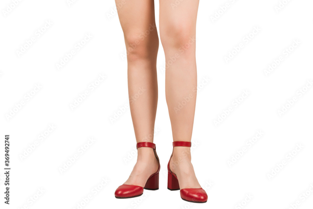 Woman legs in retro red sandals on heels. Woman legs in retro red sandals on heels.