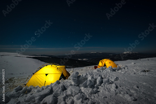 Fototapeta Naklejka Na Ścianę i Meble -  Campsite under Orion, winter night in Bieszczady mountains, Poland