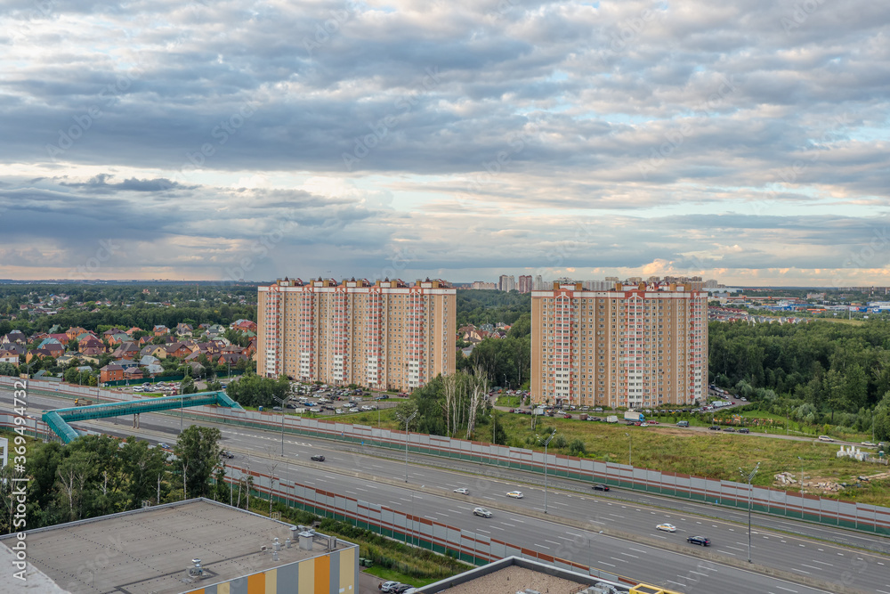 An elevated crossing over a road in the North of Moscow. New neighborhood