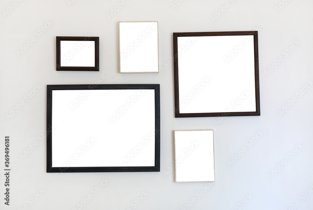 Frame of empty image on white wall background. Frame of empty image on white wall background.