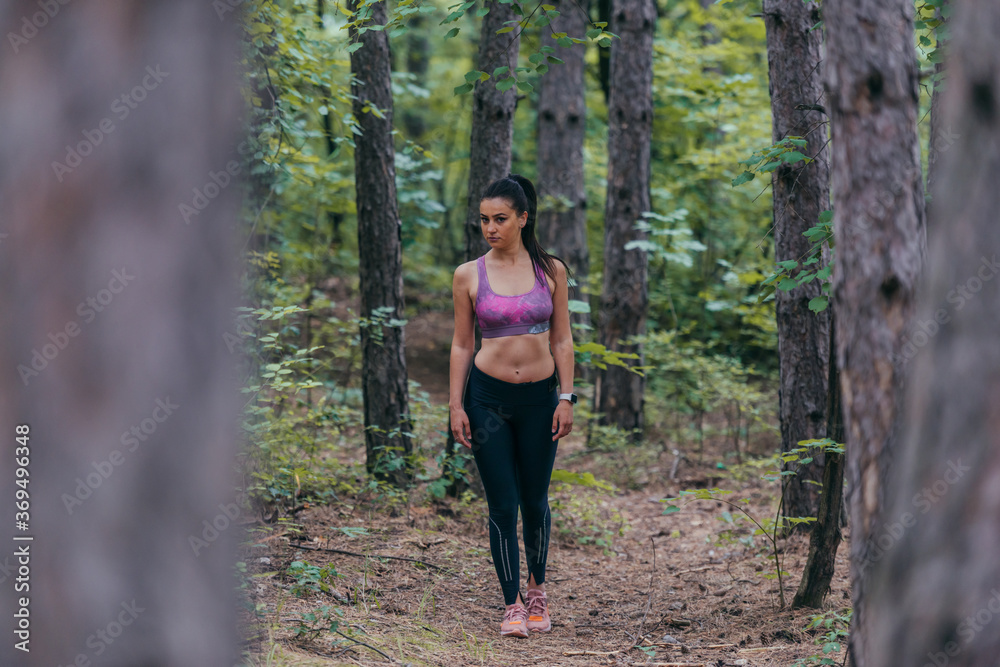 Fit male and female athletes running in nature. Nature and sports concept. Fit male and female athletes running in nature. Nature and sports concept.