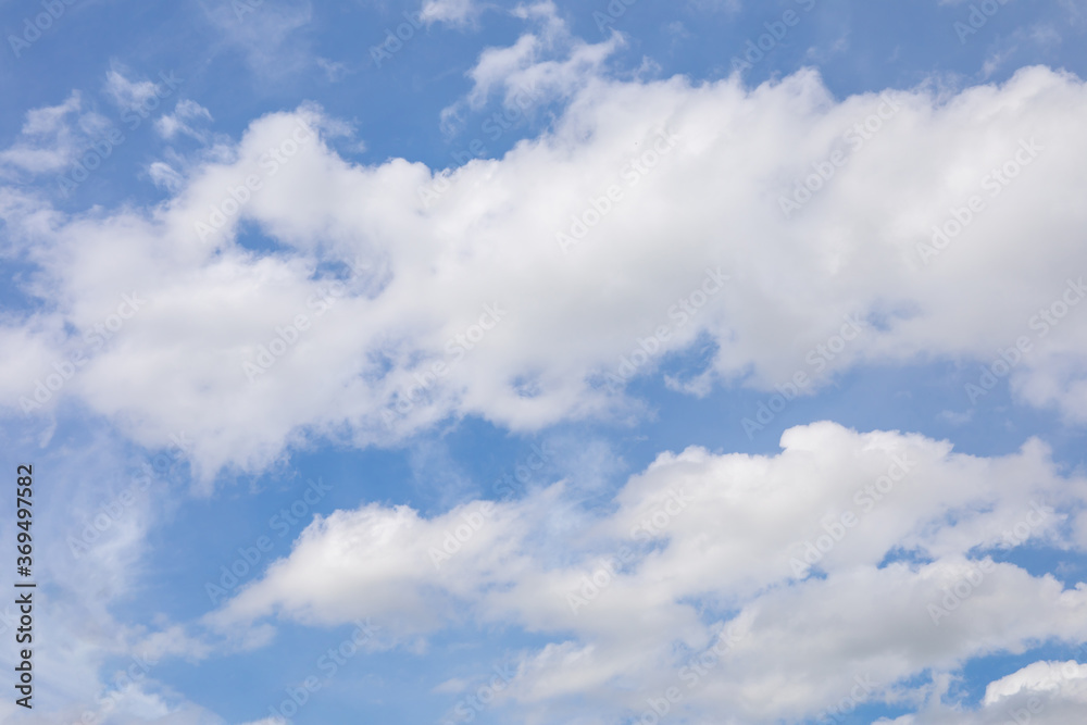 White clouds on the blue sky for background. White clouds on the blue sky for background.