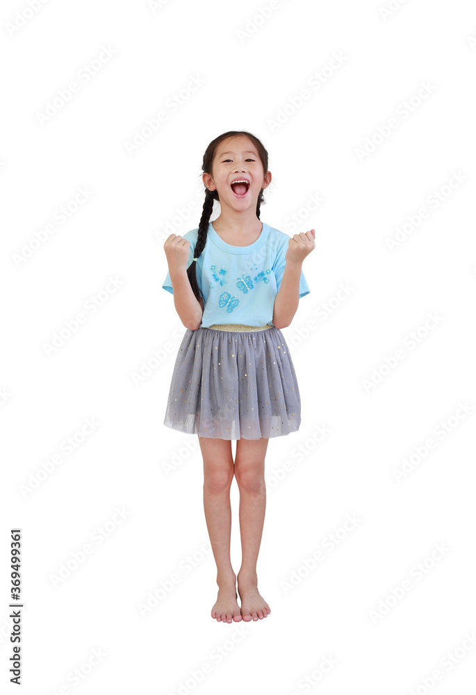 Cheerful asian little child girl with pigtail hair standing and raise hands up isolated on white background. Full length Cheerful asian little child girl with pigtail hair standing and raise hands up isolated on white background. Full length