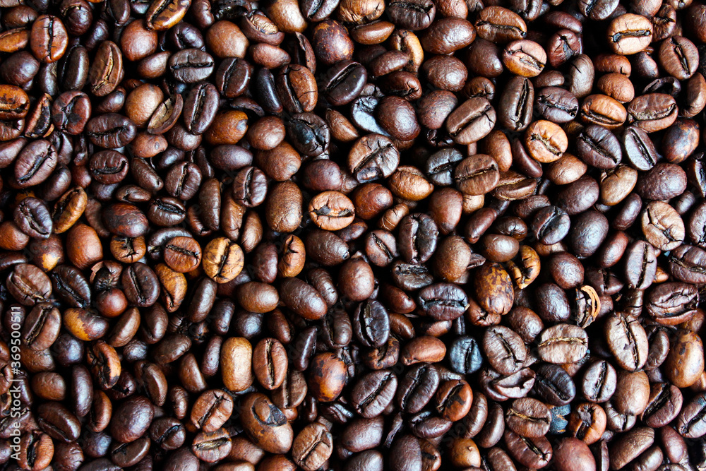 Fototapeta premium Roasted coffee beans background. Coffee background