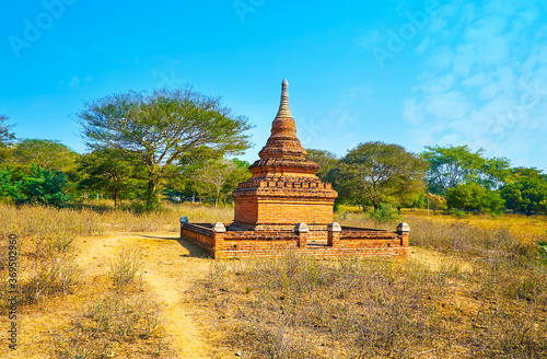 The old stupa amid the dry plain, Bagan, Myanmar photo