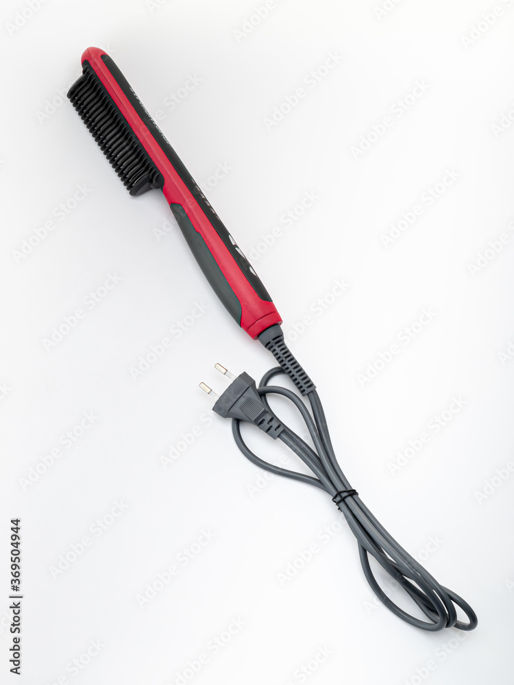 iron with a black and red comb