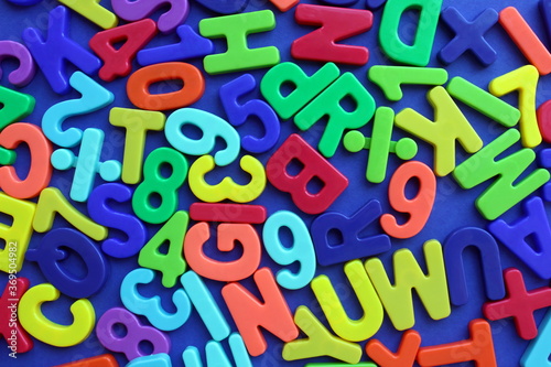 Multicolored letters and numbers on a blue background
