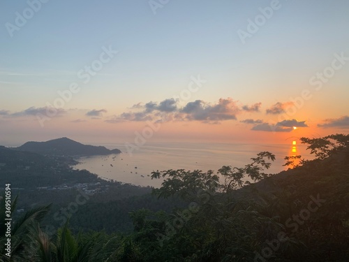 Landscape view of tropical coastline sunset on the water