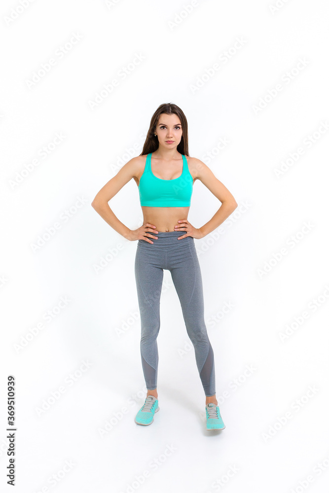 Sporty girl doing exercise on white background Sporty girl doing exercise on white background