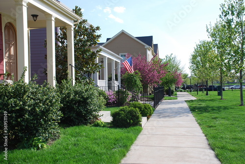 Fotografie Suburban neighborhood with sidewalk