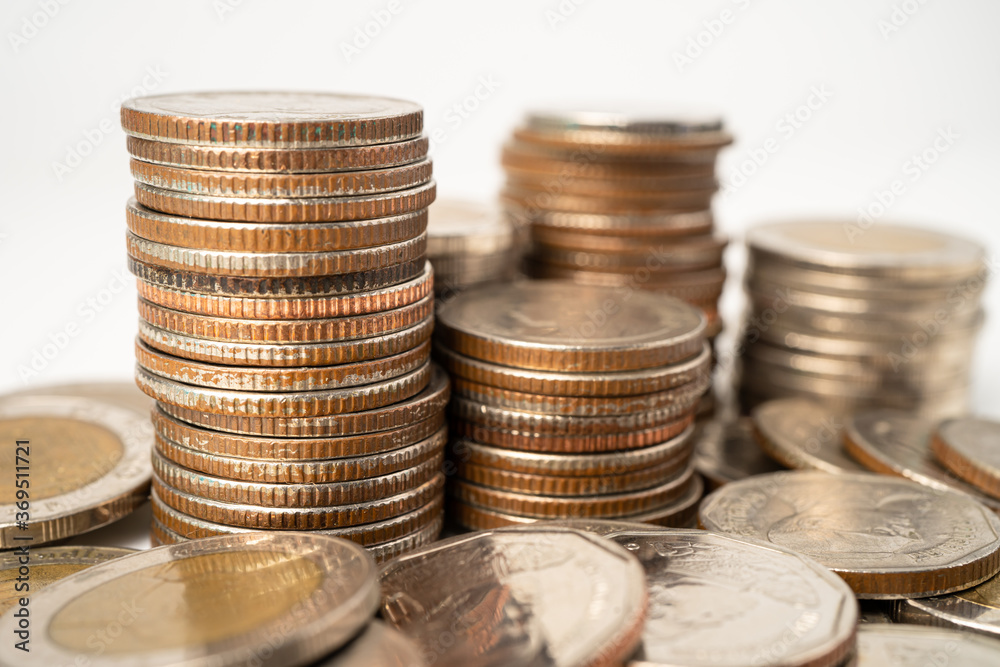 Stack of Thai baht coins on white background, Business finance investment concept. Stack of Thai baht coins on white background, Business finance investment concept.