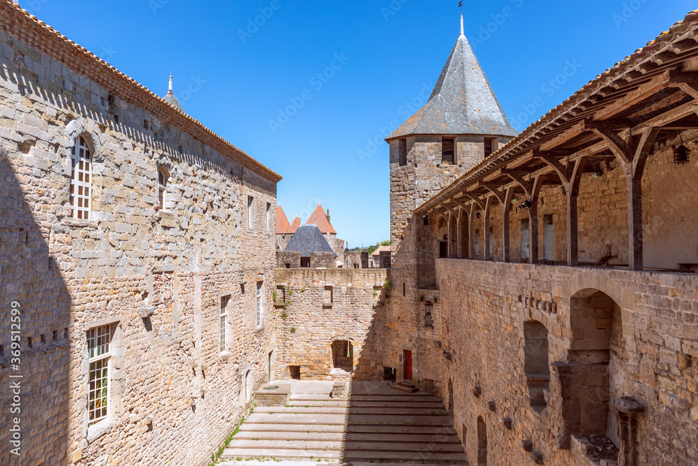 Fortified wide walls and observation towers of the medieval castle of Carcassonne town