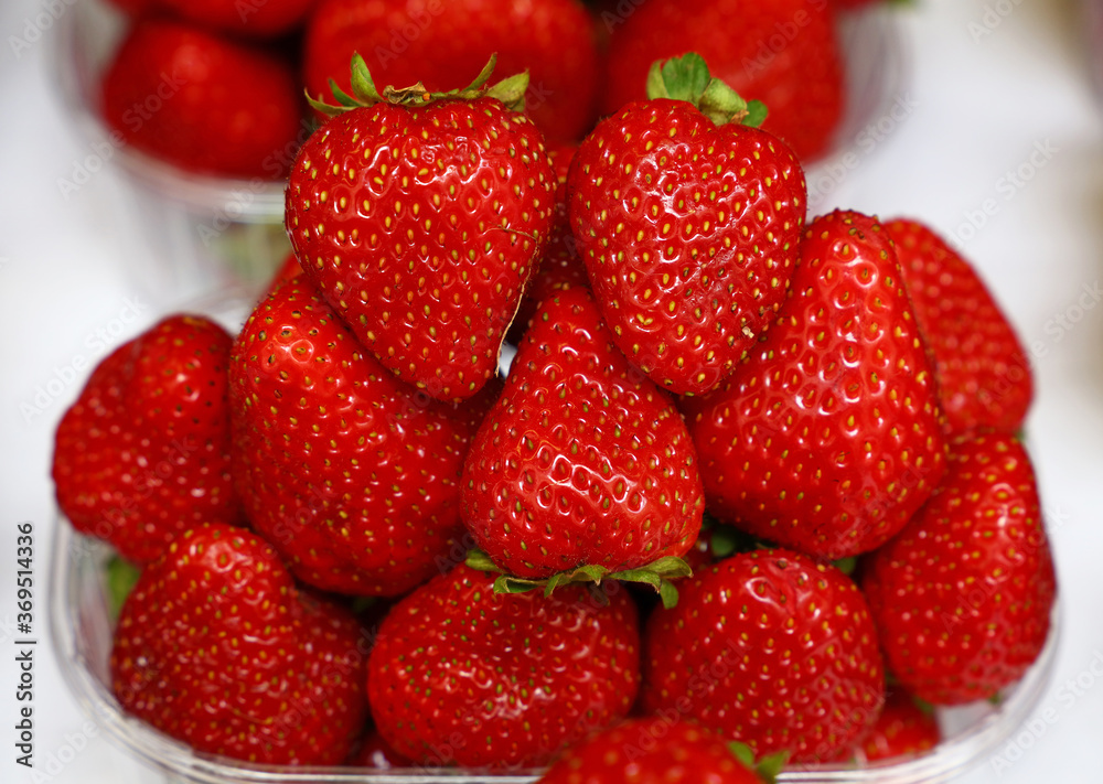 Close up red ripe strawberry on retail display