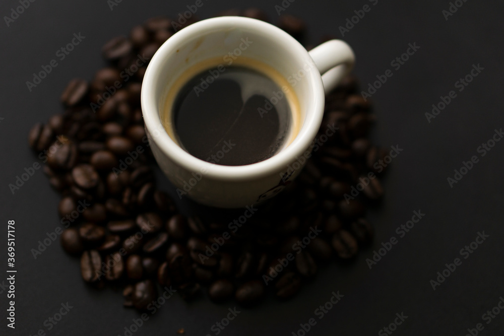 Delicious cup of coffee, with black background Delicious cup of coffee, with black background