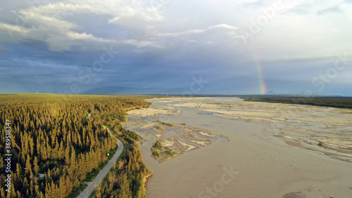 The Delta River makes it's way south from Fairbanks Alaska as a Rainbow Appears photo