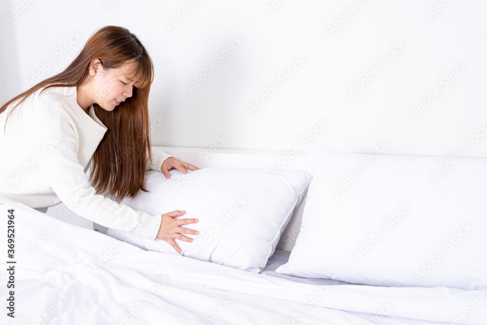 Beautiful Asian women making bed in room early in the morning. daily life concept. Beautiful Asian women making bed in room early in the morning. daily life concept.