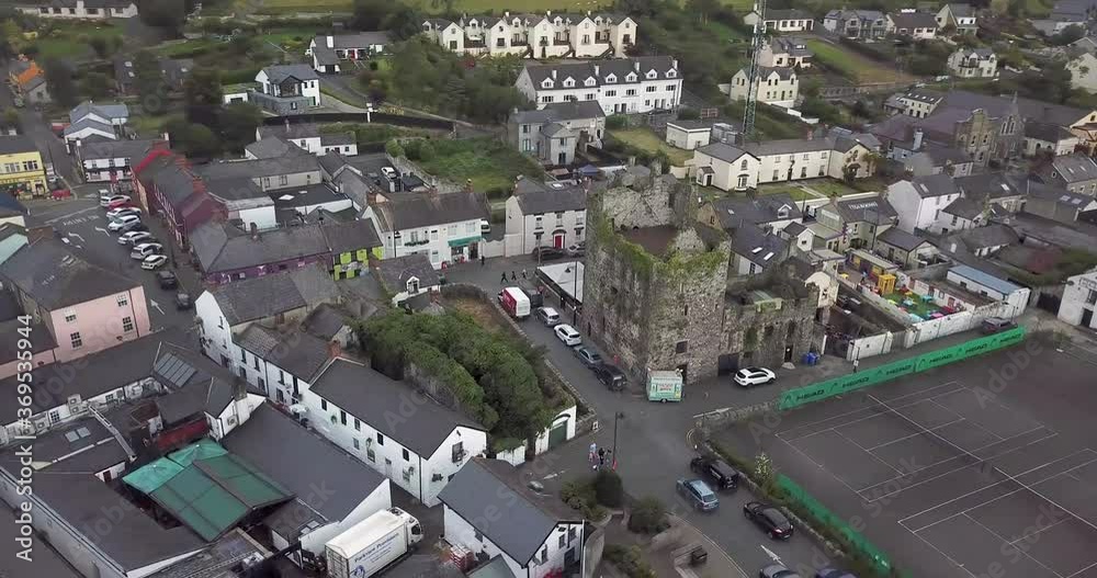 Point of view drone shot of old ruins int Carlingford town. Ireland, Co. Louth Point of view drone shot of old ruins int Carlingford town. Ireland, Co. Louth