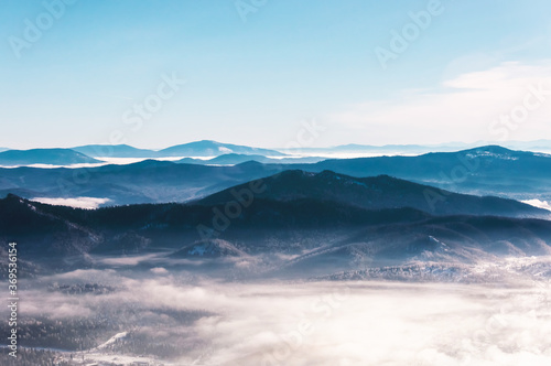 Panoramic view of Mountain Shoria with a cloud in the foreground, Siberia