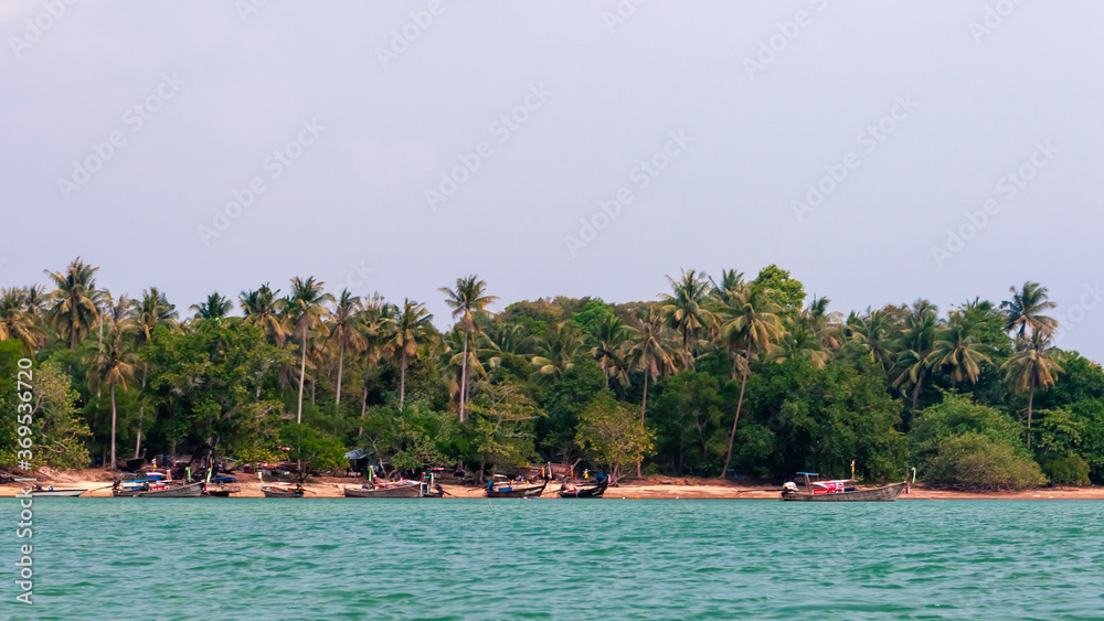 Panorama of a tropical beach in Thailand from the sea