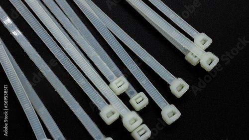 Принти на полотні Plastic ties or belts that serve to hold different things mainly to tidy up the